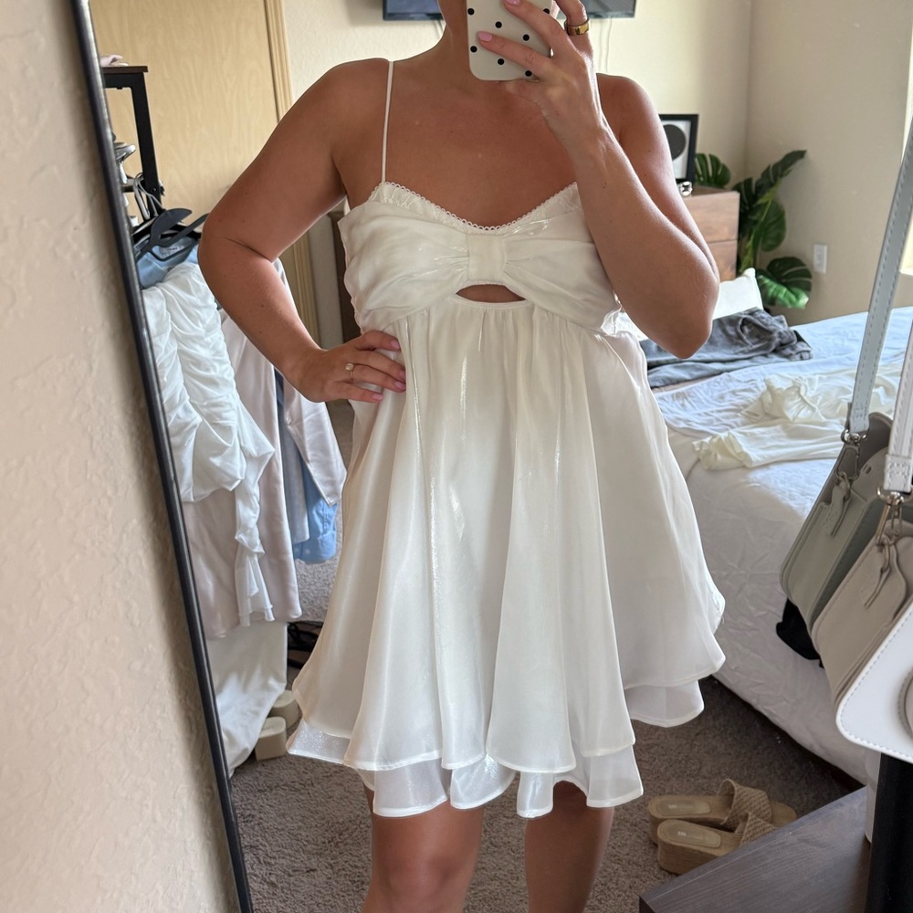 Iridescent white bow front and back mini dress